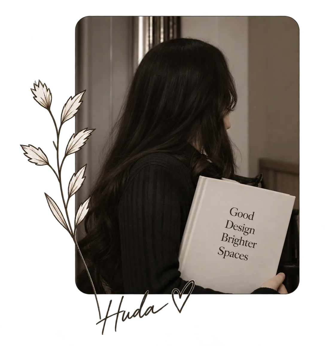 A framed photo card of Huda holding a book titled 'Good Design Brighter Spaces', signed 'Huda'